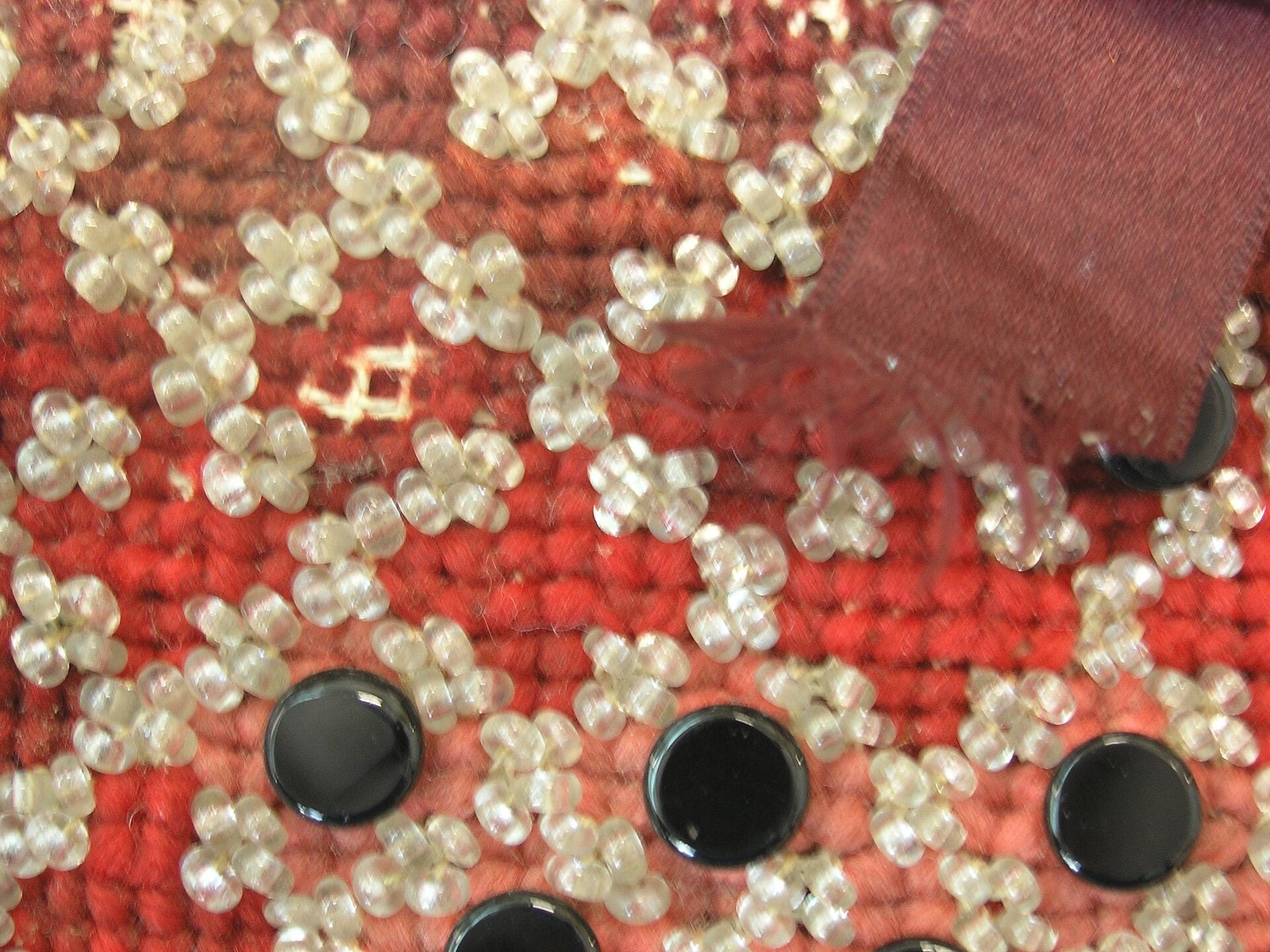 Red cross-stitch beaded clutch
